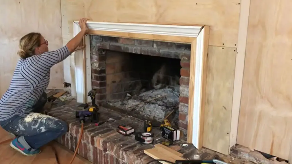 covering stone/brick fireplace with shiplap