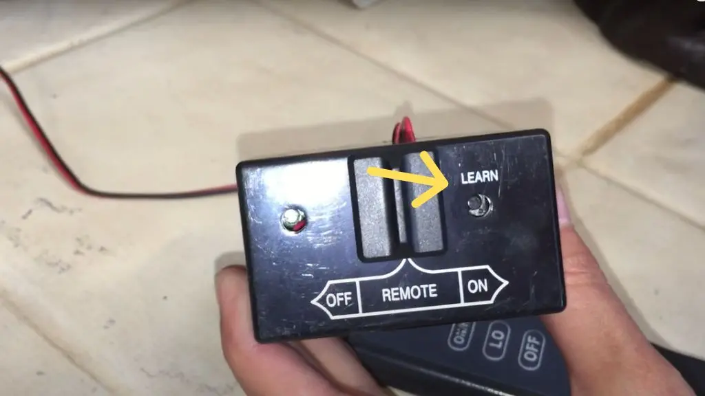 learn button on the receiver box of dimplex fireplace