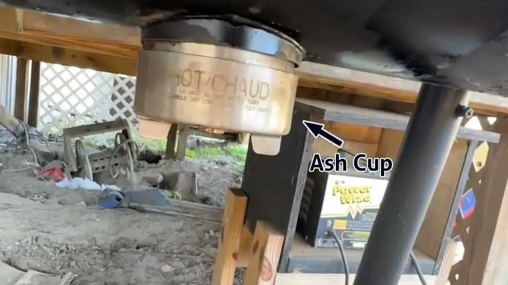 ash cup of OJ pellet grill